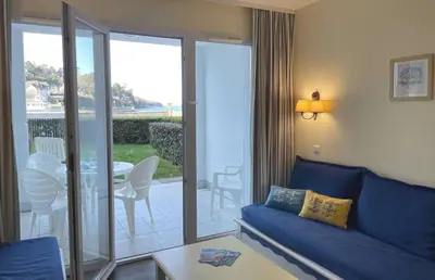 Coin salon dans l'établissement Appartement Belle Vue Mer- piscine