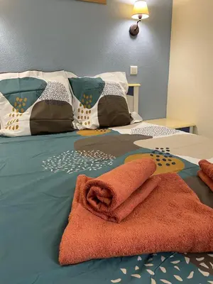 Un ou plusieurs lits dans un hébergement de l'établissement Appartement Belle Vue Mer- piscine