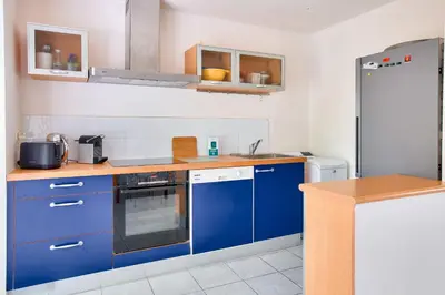 Cuisine ou kitchenette dans l'établissement Évasion proche des plages et du port