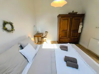 Un ou plusieurs lits dans un hébergement de l'établissement Maisonette proche de la mer