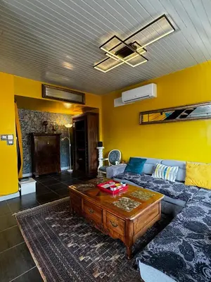 Coin salon dans l'établissement Maison Pors Haor