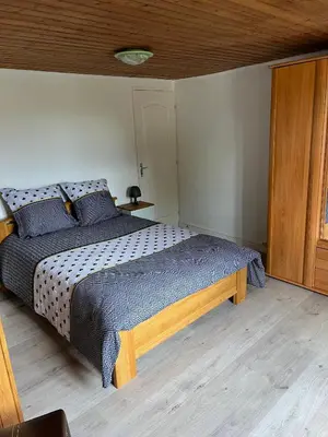 Un ou plusieurs lits dans un hébergement de l'établissement Gîte Les Hortensias