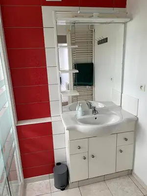 Salle de bains dans l'établissement Gîte Les Hortensias