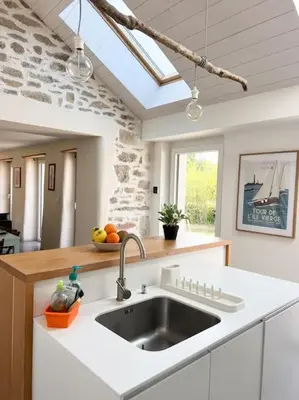 Cuisine ou kitchenette dans l'établissement Jolie maison de vacances à 5 mn à pied des plages