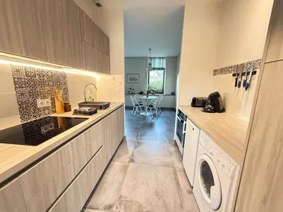 Cuisine ou kitchenette dans l'établissement Gîte de Louise