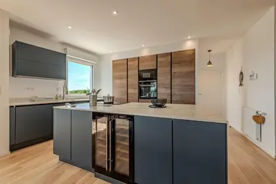 Cuisine ou kitchenette dans l'établissement Appartement standing vue mer imprenable