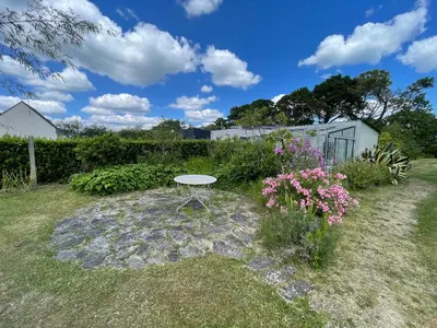 Jardin de l'établissement Maison vintage en bord de mer