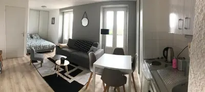 Un ou plusieurs lits dans un hébergement de l'établissement Appartement proche des plages