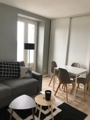 Coin salon dans l'établissement Appartement proche des plages
