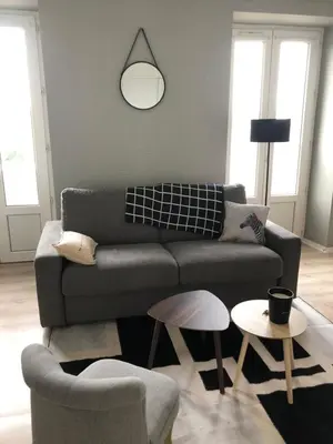Coin salon dans l'établissement Appartement proche des plages