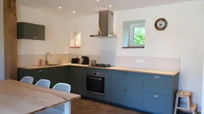 Cuisine ou kitchenette dans l'établissement Les gites de koatephani et ses animaux