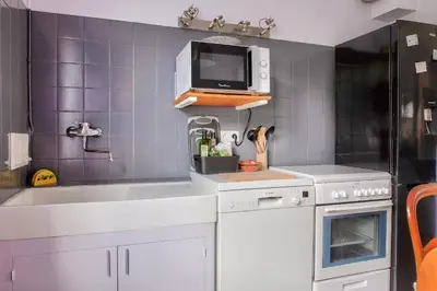 Cuisine ou kitchenette dans l'établissement Concarneau - 300m des plages