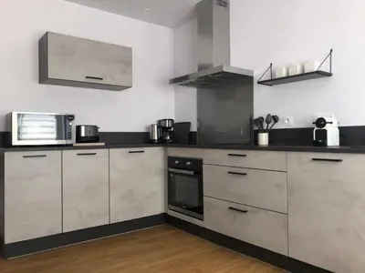 Cuisine ou kitchenette dans l'établissement Ty Albertine - Maison de campagne rénovée proche de la mer