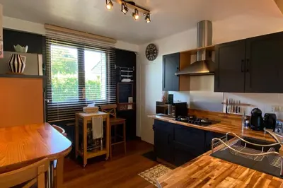 Cuisine ou kitchenette dans l'établissement Maison Molière