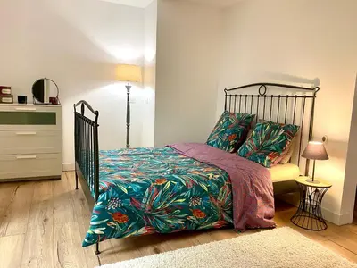 Un ou plusieurs lits dans un hébergement de l'établissement Appartement cosy