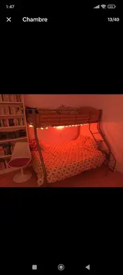 Un ou plusieurs lits dans un hébergement de l'établissement Grande chambre chez l'habitant dans hypercentre piéton