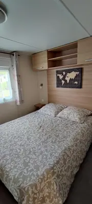 Un ou plusieurs lits dans un hébergement de l'établissement Mobil-home 6 couchages