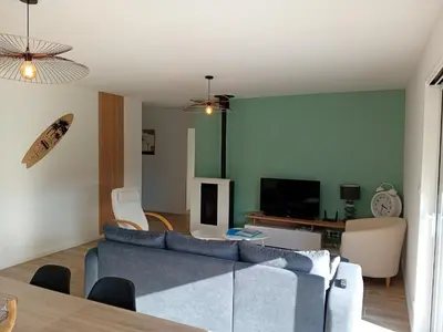 Télévision ou salle de divertissement dans l'établissement La Maison du Lividig 3 étoiles OT29