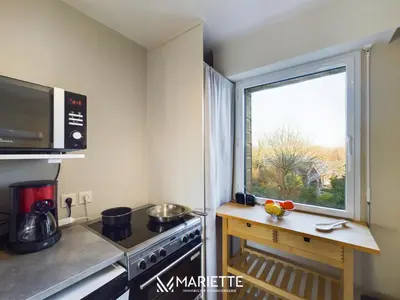 Cuisine ou kitchenette dans l'établissement -LITTO- Concarneau avec terrasse proche commerces