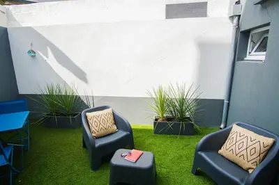 Coin salon dans l'établissement -PICCO ROSSO- Studio avec terrasse- Concarneau