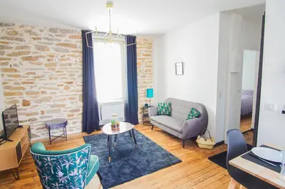 Coin salon dans l'établissement -PICCO VERDE- Appartement avec balcon - Concarneau