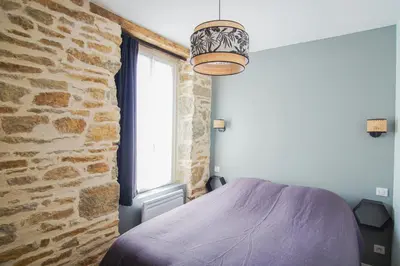 Un ou plusieurs lits dans un hébergement de l'établissement -PICCO VERDE- Appartement avec balcon - Concarneau