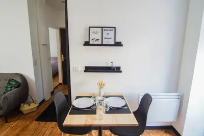 Coin salon dans l'établissement -PICCO VERDE- Appartement avec balcon - Concarneau