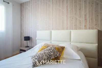 Un ou plusieurs lits dans un hébergement de l'établissement -DALIA- Appartement centre-ville-terasse-parking