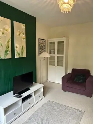 Télévision ou salle de divertissement dans l'établissement repos en forêt