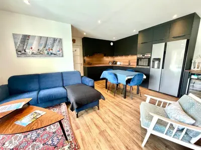 Cuisine ou kitchenette dans l'établissement Jolie résidence proche du centre ville