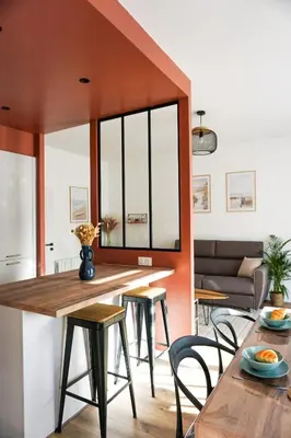 Coin salon dans l'établissement -IRIS- Magnifique T2 renove avec balcon et parking