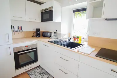 Cuisine ou kitchenette dans l'établissement -PETREL- Maison de campagne avec grand jardin