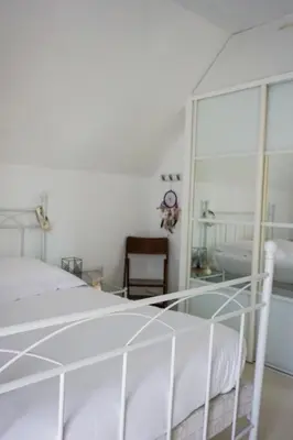 Un ou plusieurs lits dans un hébergement de l'établissement -COLINE- Charmante maison familiale proche plage