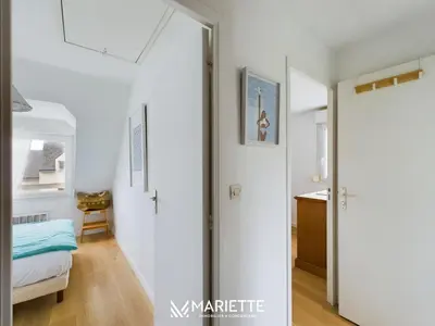 Un ou plusieurs lits dans un hébergement de l'établissement -COTTAGE- Maison chaleureuse en bord de mer