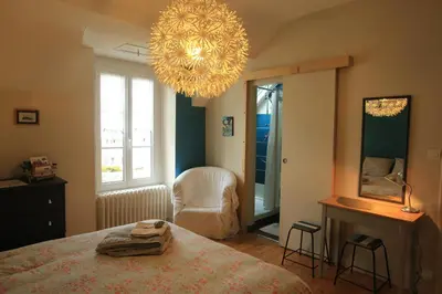 Un ou plusieurs lits dans un hébergement de l'établissement Chambre d'Hôte à Douarnenez