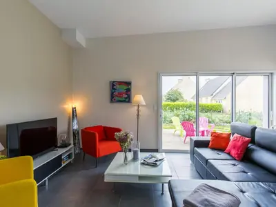 Coin salon dans l'établissement Holiday Home Terre et Mer by Interhome