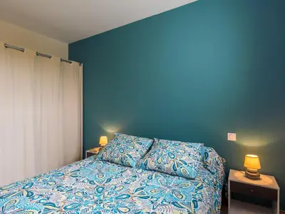 Un ou plusieurs lits dans un hébergement de l'établissement Holiday Home Terre et Mer by Interhome