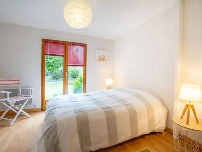 Un ou plusieurs lits dans un hébergement de l'établissement Chalet Les Hortensias by Interhome