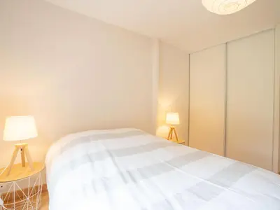 Un ou plusieurs lits dans un hébergement de l'établissement Chalet Les Hortensias by Interhome