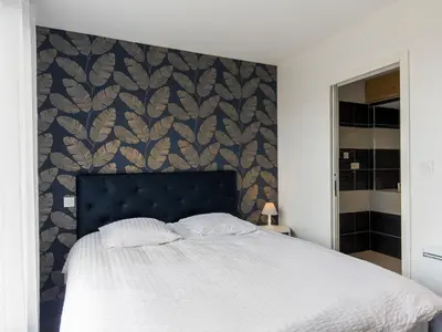 Un ou plusieurs lits dans un hébergement de l'établissement Holiday Home Kernic Ty by Interhome