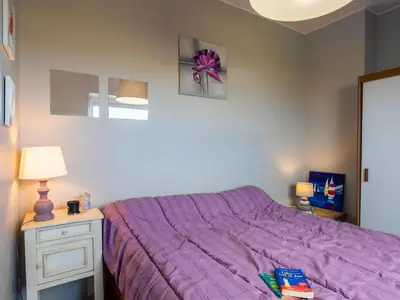 Un ou plusieurs lits dans un hébergement de l'établissement Holiday Home Echo de Vagues by Interhome