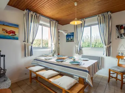 Coin salon dans l'établissement Holiday Home Echo de Vagues by Interhome