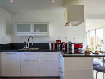 Cuisine ou kitchenette dans l'établissement Holiday Home Ty Mamm by Interhome