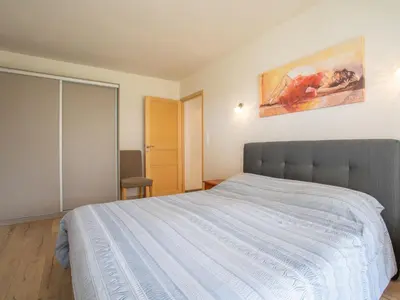 Un ou plusieurs lits dans un hébergement de l'établissement Apartment Les Chardons Bleus 1 by Interhome