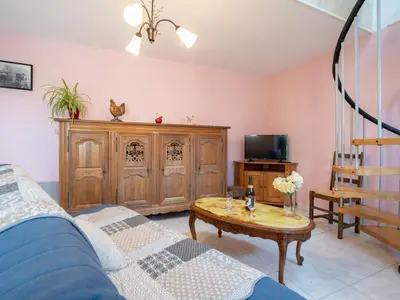 Télévision ou salle de divertissement dans l'établissement Holiday Home Les Azalées by Interhome