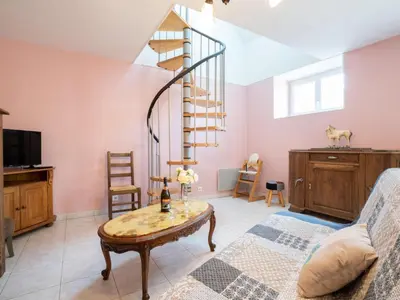 Télévision ou salle de divertissement dans l'établissement Holiday Home Les Azalées by Interhome