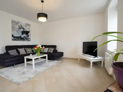 Télévision ou salle de divertissement dans l'établissement Holiday Home L'Oasis by Interhome