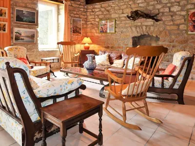 Coin salon dans l'établissement Holiday Home La Ferme by Interhome
