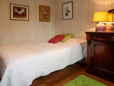 Un ou plusieurs lits dans un hébergement de l'établissement Holiday Home La Grange by Interhome