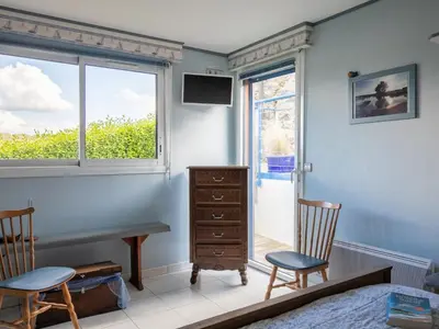 Télévision ou salle de divertissement dans l'établissement Chalet Ty Glas by Interhome